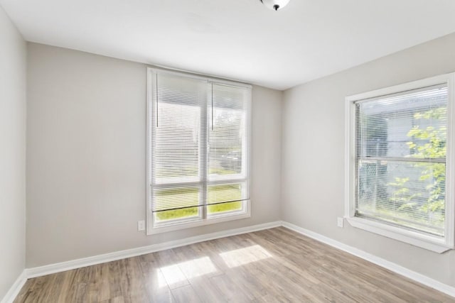 208 Preston St, La Marque, TX 77568 - unfurnished room featuring light wood-style floors and baseboards