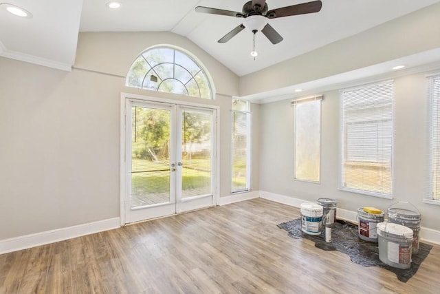 208 Preston St, La Marque, TX 77568 - spare room featuring lofted ceiling, wood finished floors, ceiling fan, baseboards, and recessed lighting