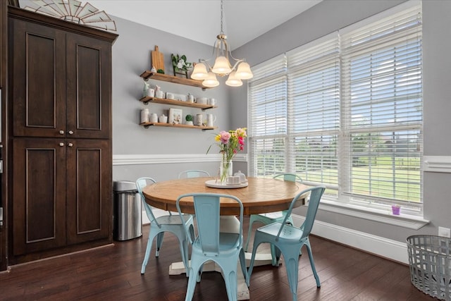 231 N Waterstone Dr, Montgomery, TX 77356 - dining space featuring a chandelier, dark wood-type flooring, and baseboards