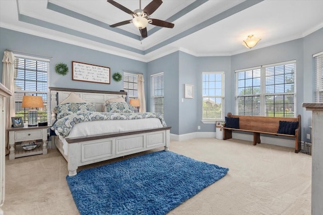 231 N Waterstone Dr, Montgomery, TX 77356 - bedroom featuring light carpet, multiple windows, crown molding, and a raised ceiling