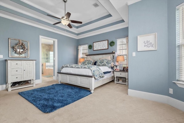 231 N Waterstone Dr, Montgomery, TX 77356 - bedroom with carpet flooring, crown molding, a raised ceiling, baseboards, and ensuite bath