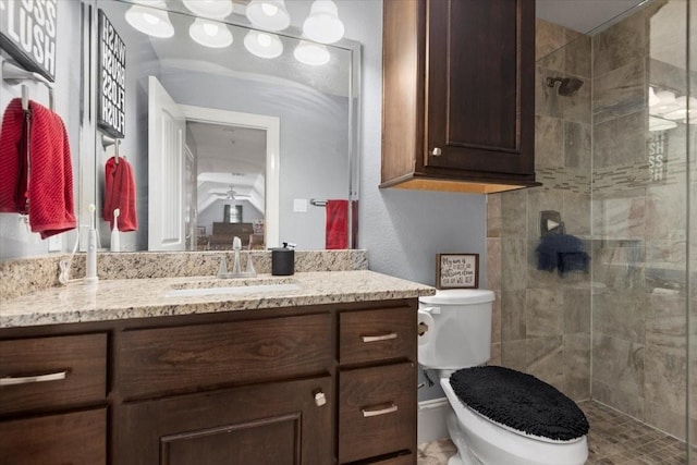 231 N Waterstone Dr, Montgomery, TX 77356 - bathroom featuring toilet, vanity, and a stall shower