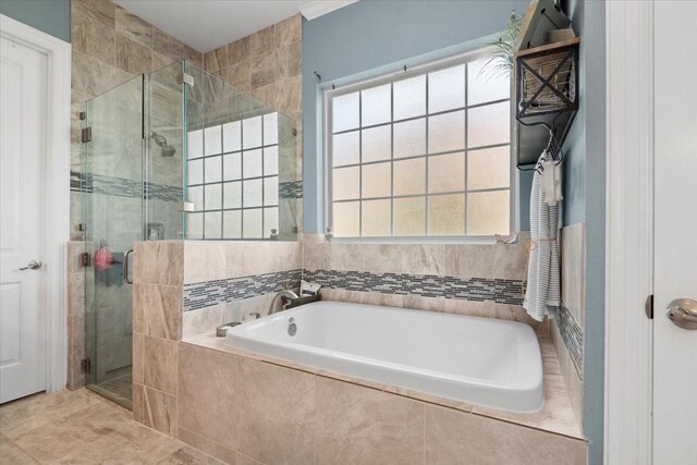231 N Waterstone Dr, Montgomery, TX 77356 - bathroom featuring a bath and a shower stall