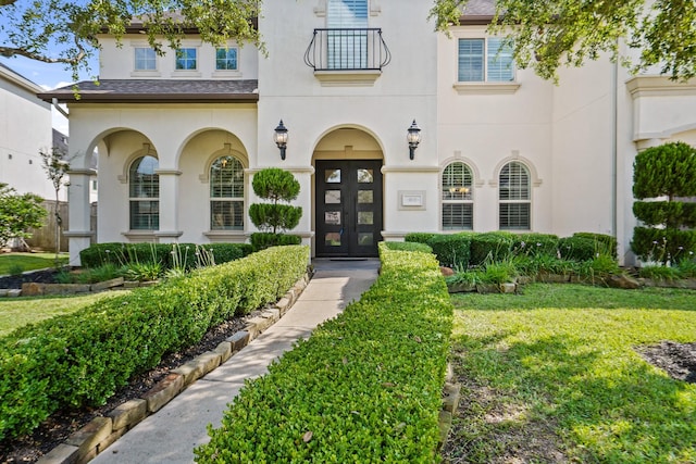 9810 Mount Whitney, Missouri City, TX 77459 - view of front of house featuring stucco siding and a front yard
