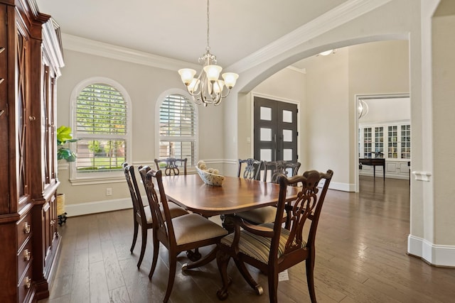 9810 Mount Whitney, Missouri City, TX 77459 - dining area with arched walkways, french doors, a chandelier, dark wood-style flooring, and baseboards