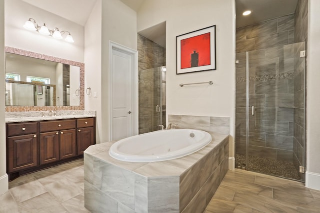 9810 Mount Whitney, Missouri City, TX 77459 - bathroom featuring vanity, a shower stall, and a tub with jets