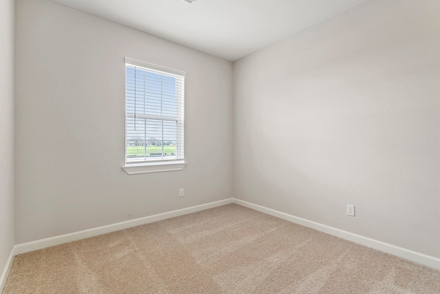 10518 Sutter Creek Dr, Iowa Colony, TX 77583 - carpeted spare room with baseboards