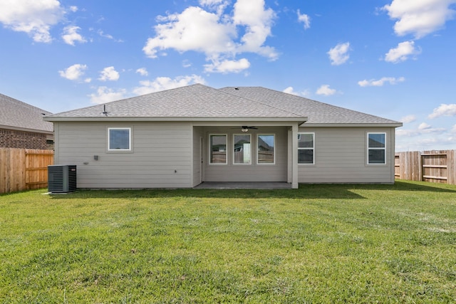 10518 Sutter Creek Dr, Iowa Colony, TX 77583 - back of property with ceiling fan, a patio area, roof with shingles, and central AC