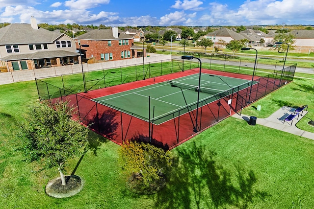 10518 Sutter Creek Dr, Iowa Colony, TX 77583 - view of tennis court with a residential view