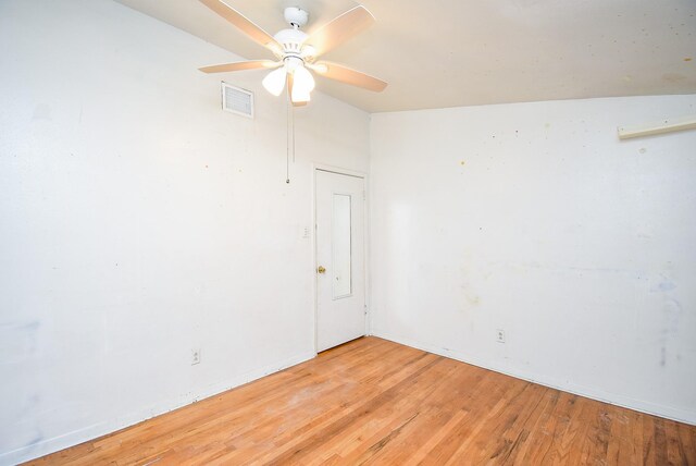 8602 Ariel St, Houston, TX 77074 - unfurnished room with light wood-type flooring, a ceiling fan, and baseboards