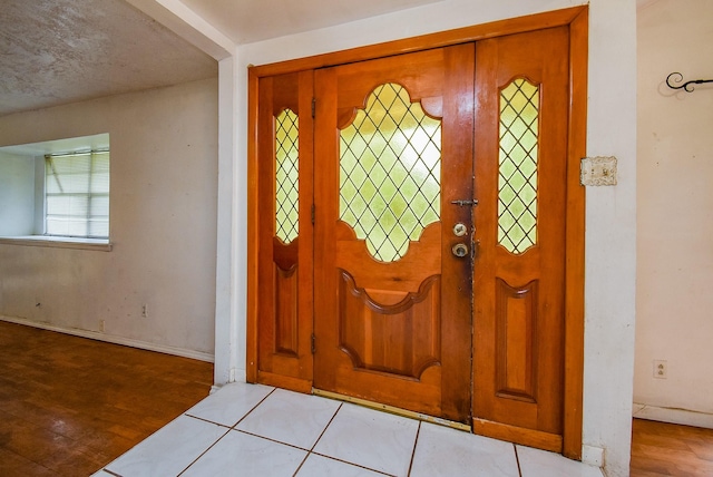 8602 Ariel St, Houston, TX 77074 - entrance foyer with wood finished floors