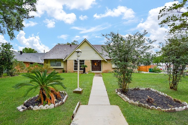 8602 Ariel St, Houston, TX 77074 - view of front of property featuring brick siding and roof with shingles