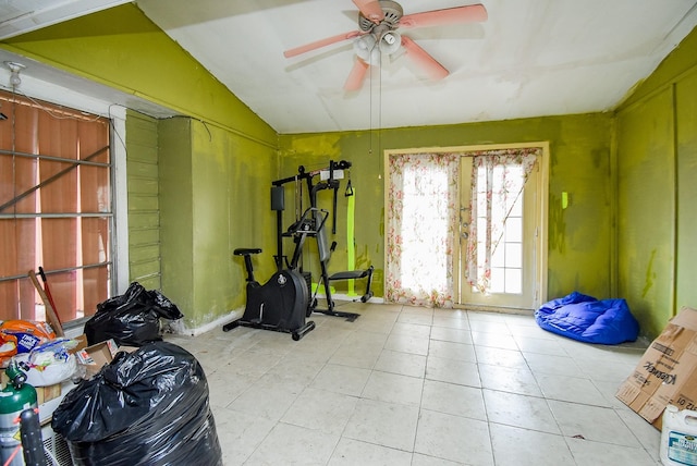 8602 Ariel St, Houston, TX 77074 - exercise room with ceiling fan, vaulted ceiling, and tile patterned flooring