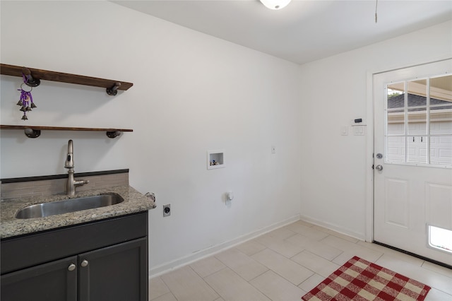 215 Whispering Oaks Dr, Taylor Lake Village, TX 77586 - washroom with hookup for an electric dryer, washer hookup, cabinet space, and baseboards