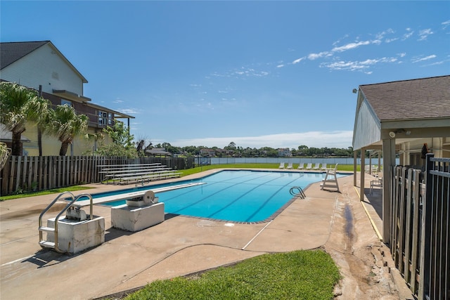 215 Whispering Oaks Dr, Taylor Lake Village, TX 77586 - view of swimming pool featuring a patio area