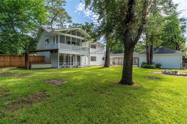 215 Whispering Oaks Dr, Taylor Lake Village, TX 77586 - view of rear view of property