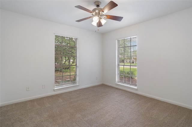 215 Whispering Oaks Dr, Taylor Lake Village, TX 77586 - empty room featuring carpet flooring, baseboards, and ceiling fan