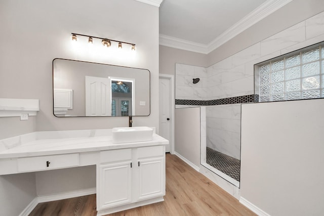 1410 Long View Dr, Pearland, TX 77581 - bathroom with a walk in shower, crown molding, vanity, and wood finished floors