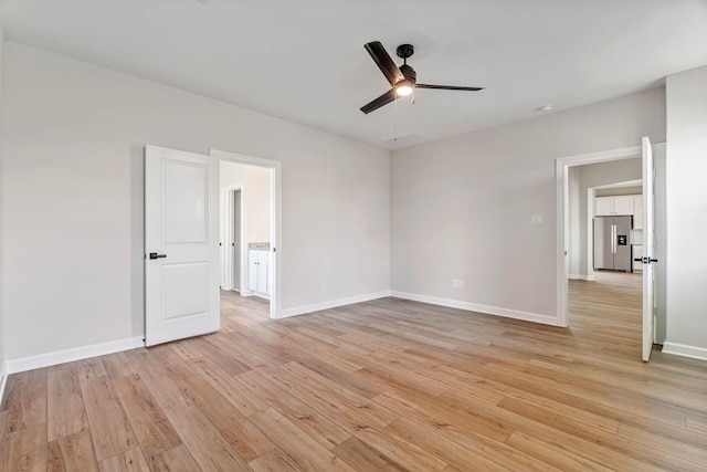 1927 June Lake Ln, Iowa Colony, TX 77583 - empty room with ceiling fan, light wood finished floors, and baseboards