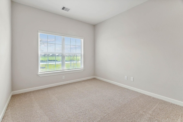 1927 June Lake Ln, Iowa Colony, TX 77583 - carpeted empty room with baseboards