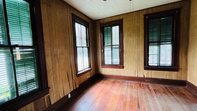 614 18th St, Galveston, TX 77550 - unfurnished room featuring wood finished floors, baseboards, and wood walls
