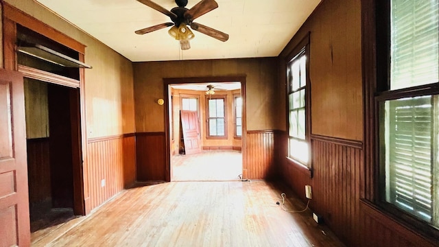 614 18th St, Galveston, TX 77550 - corridor featuring wood finished floors, a wainscoted wall, and wooden walls