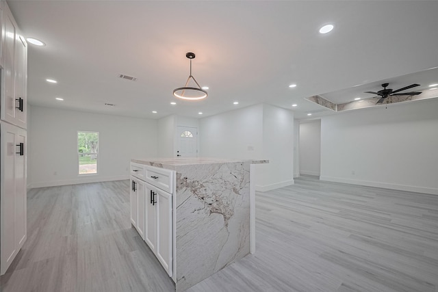 15622 Corsair Rd, Houston, TX 77053 - kitchen with open floor plan, light wood-style flooring, baseboards, and recessed lighting