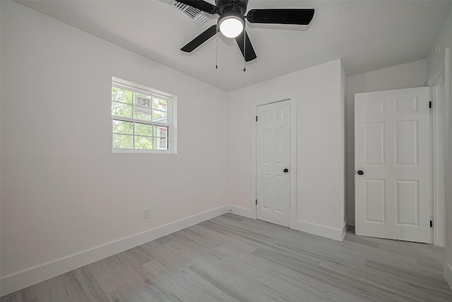 15622 Corsair Rd, Houston, TX 77053 - unfurnished bedroom with light wood-style floors, baseboards, and a ceiling fan