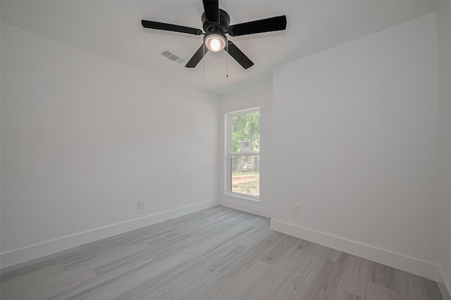 15622 Corsair Rd, Houston, TX 77053 - empty room with light wood-style floors, baseboards, and a ceiling fan