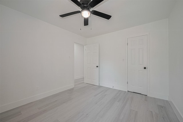 15622 Corsair Rd, Houston, TX 77053 - unfurnished room with light wood finished floors, a ceiling fan, and baseboards