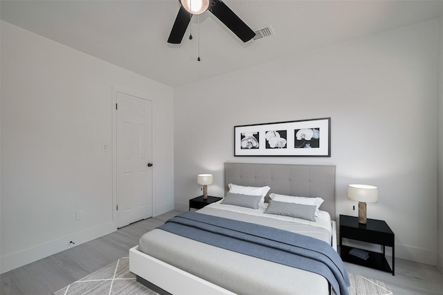 15622 Corsair Rd, Houston, TX 77053 - bedroom featuring wood finished floors, baseboards, and ceiling fan
