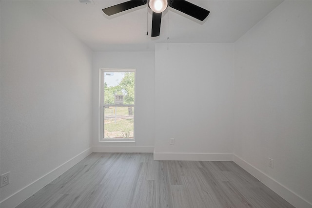 15622 Corsair Rd, Houston, TX 77053 - unfurnished room featuring light wood-type flooring, ceiling fan, and baseboards
