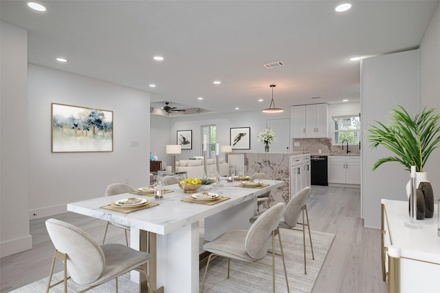 15622 Corsair Rd, Houston, TX 77053 - dining room with light wood-style flooring, recessed lighting, ceiling fan, and baseboards