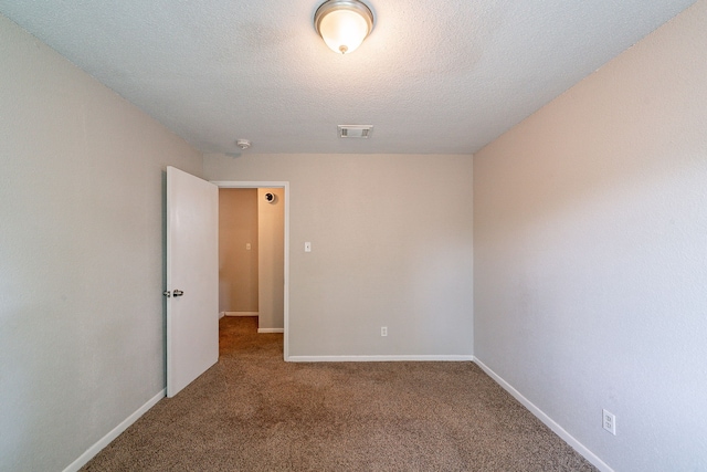 7631 Southmeadow Dr, Houston, TX 77071 - spare room featuring carpet, baseboards, and a textured ceiling