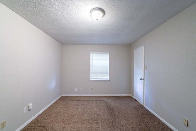 7631 Southmeadow Dr, Houston, TX 77071 - carpeted empty room featuring a textured ceiling and baseboards