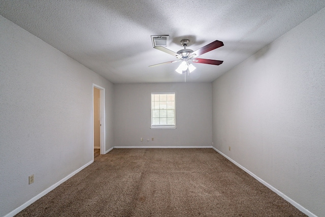 7631 Southmeadow Dr, Houston, TX 77071 - empty room with carpet, a ceiling fan, baseboards, and a textured ceiling