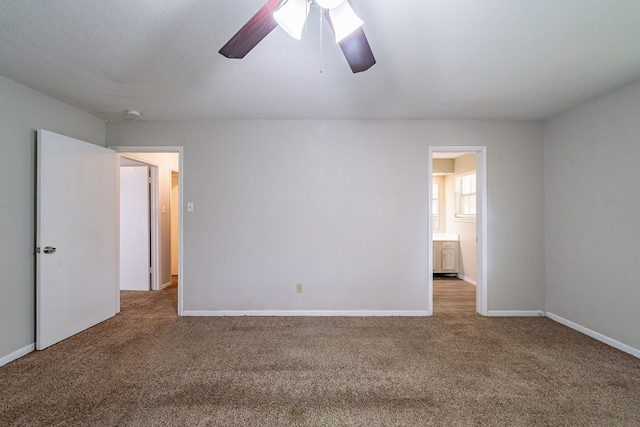 7631 Southmeadow Dr, Houston, TX 77071 - unfurnished bedroom featuring carpet flooring, ceiling fan, baseboards, and ensuite bath