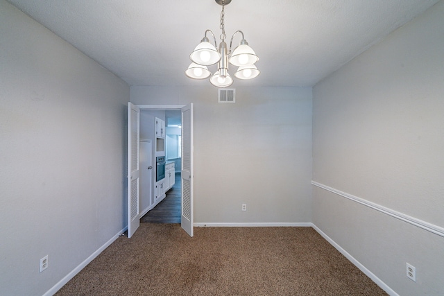 7631 Southmeadow Dr, Houston, TX 77071 - carpeted empty room featuring a chandelier and baseboards