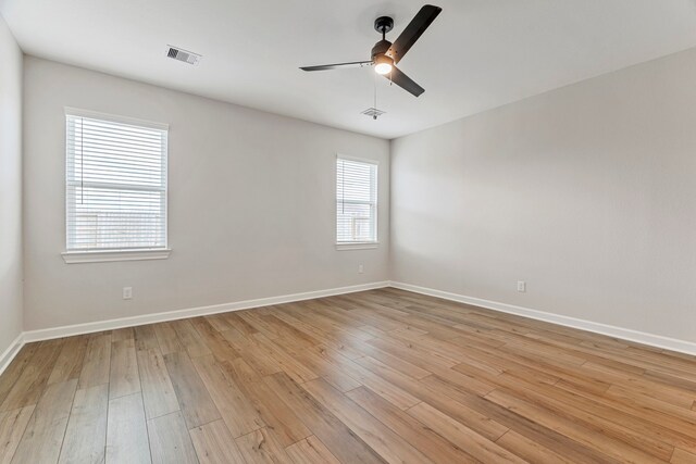 10514 Sutter Creek Dr, Iowa Colony, TX 77583 - spare room with ceiling fan, light wood-style floors, and baseboards