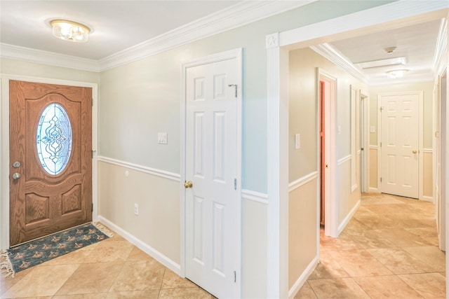 3415 80th St, Galveston, TX 77551 - entrance foyer featuring ornamental molding, light tile patterned flooring, and baseboards