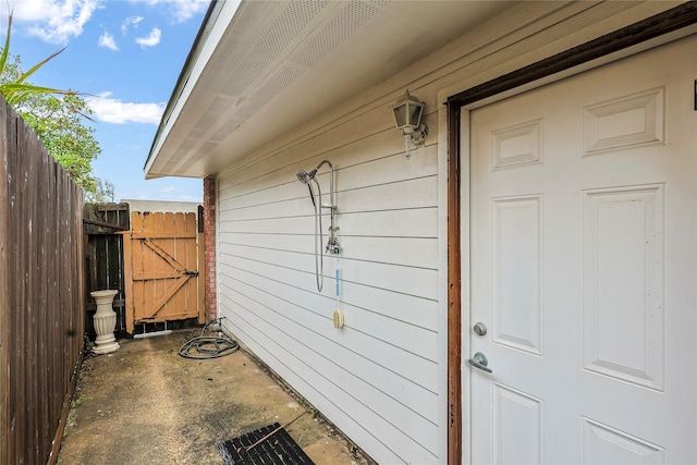 3415 80th St, Galveston, TX 77551 - view of exterior entry with a gate