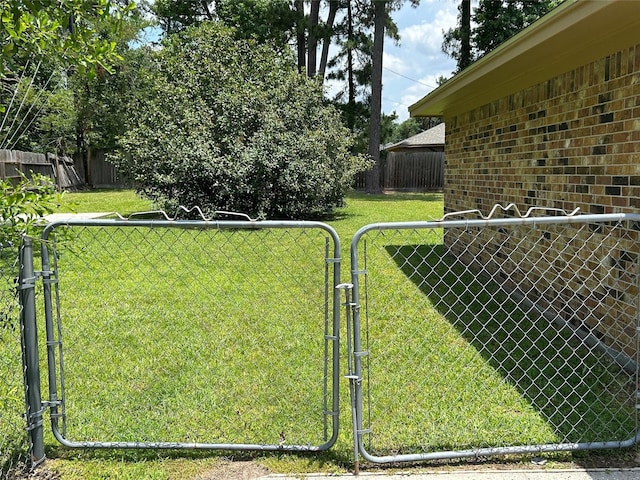 203 Ridgewood Dr, Spring, TX 77386 - view of yard featuring a gate