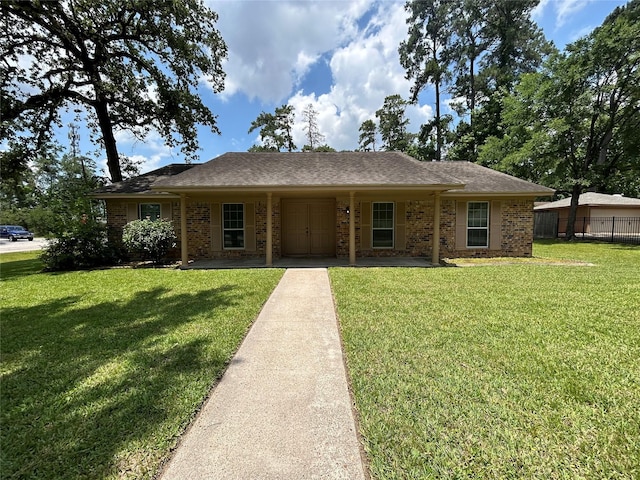 203 Ridgewood Dr, Spring, TX 77386 - view of front of house with brick siding