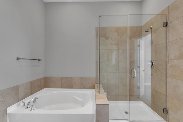 17040 W Fm 1097 Unit 5102, Montgomery, TX 77356 - bathroom featuring a garden tub and a stall shower
