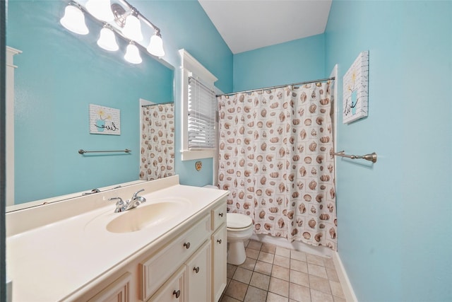 606 E 27th St, Houston, TX 77008 - full bath featuring toilet, vanity, tile patterned flooring, and baseboards