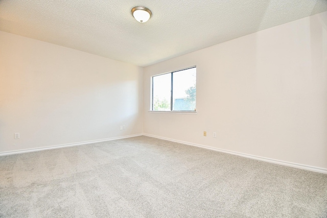 5001 Lamonte Ln Unit 14, Houston, TX 77092 - spare room featuring carpet flooring and baseboards
