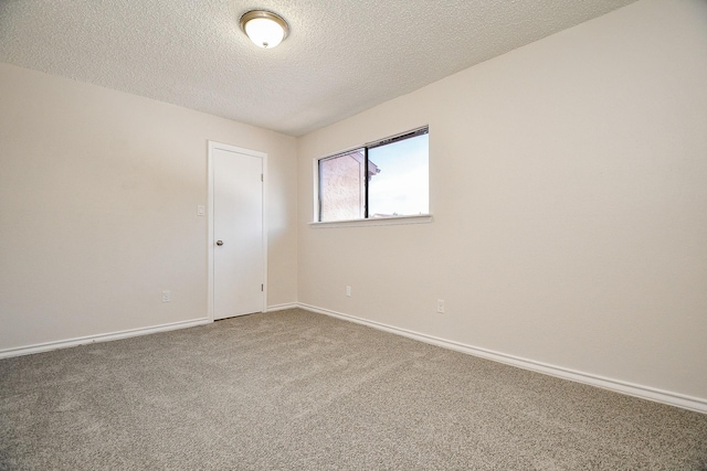 5001 Lamonte Ln Unit 14, Houston, TX 77092 - unfurnished room featuring a textured ceiling, carpet, and baseboards