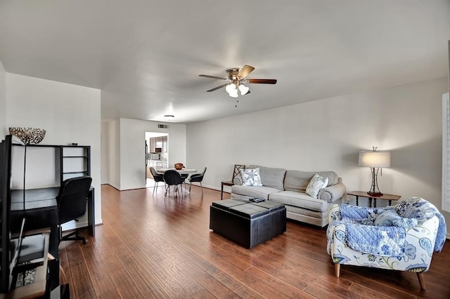 9003 Gaylord St Unit 12, Houston, TX 77024 - living room featuring a ceiling fan and dark wood finished floors