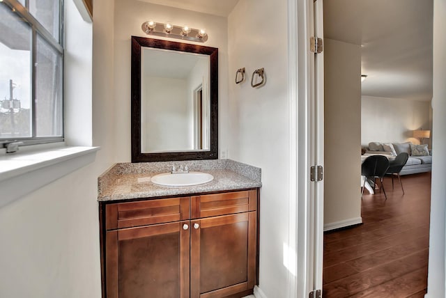 9003 Gaylord St Unit 12, Houston, TX 77024 - bathroom with vanity and wood finished floors