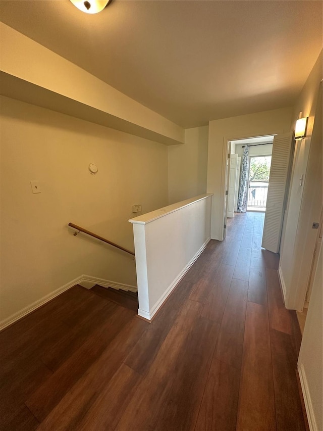 9003 Gaylord St Unit 12, Houston, TX 77024 - corridor with an upstairs landing and dark wood-type flooring